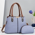 Schicke blaue Textil-Handtasche im Set mit kleiner Tasche, braunem Ledergriff und Gold-Hardware - Blau