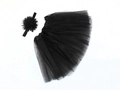 Detailed close-up of a black layered tulle tutu skirt and matching floral headband set - Black
