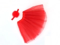 Detailed close-up of red chiffon baby tutu skirt and matching floral headband set - Top And Bottom / Red