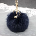 Portachiavi pompon in pelliccia sintetica blu scuro con chiusura dorata e perla - Blu Notte