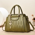 Olive green crossbody bag with elegant embossed texture and pearl charm for women - Green