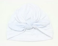 Detail of soft white cotton baby turban hat with a stylish front knot for newborns - White