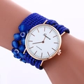 Fashionable dark blue multi-layer wrap watch with crystal accents and floral charm - Sapphire Blue