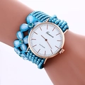 Elegant rose gold watch with blue suede wrap bracelet and sparkling crystal flowers - Sky Blue
