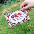 Cartoon owl print canvas coin purse with zipper and metal hook held in hands - Pattern 14