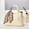 Cream lychee textured handbag with houndstooth silk scarf handle and crossbody strap - Off-white