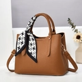 Brown litchi leather handbag with houndstooth silk scarf and gold hardware accents - Brown