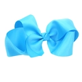 Detail of a large 15cm sky blue grosgrain ribbon bow hair clip with fine ribbed texture - Blue