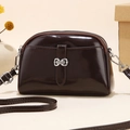 Deep brown glossy leather mini crossbody bag with double zippers and silver hardware - Red Brown