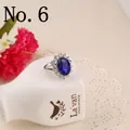 Size 6 royal blue sapphire ring with oval crystal halo and silver band finish - US 6 / Blue/Silver