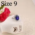 Anello cocktail vintage con zaffiro blu e alone di diamanti misura 9 elegante - US 9 / Blu/Argento