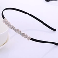 Thin black headband with rose gold wavy rhinestones for a stylish Korean hair look - Wave Rhinestone Bowtie
