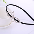 Sparkling black rhinestone butterfly headband for girls featuring delicate metal alloy bow - Bow