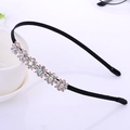 Elegant black headband featuring rhinestone-encrusted metal flowers on a slim band - Six Fabric Plum Blossoms