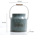 Rustic 19.5cm blue metal garden planter with wooden handle and Garden embossed text - Style I