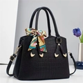 Elegant black crocodile pattern handbag with gold cat accents and silk scarf detail - Black