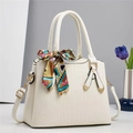 Elegant white crocodile embossed crossbody bag with decorative geometric silk scarf handle - Off White