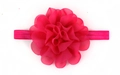 Macro detail of magenta handmade chiffon flower on elastic baby headband hair accessory - Rose Red
