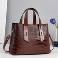 Dark brown crocodile embossed handbag with gold hardware and removable shoulder strap - Brown