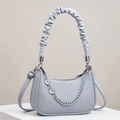 Elegant light blue-grey leather handbag for women featuring a moon chain and pleated handle - Gray