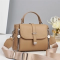 Elegant light brown pebble leather handbag with top handle and crossbody nylon strap - Khaki
