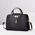 Fashionable black faux crocodile handbag with gold deer pendant and round handle for women - Black