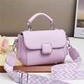 Lavender lychee leather crossbody handbag with silver buckle and wide geometric strap - Purple