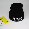 Close-up of black knitted beanie featuring white KING embroidery on the folded cuff - M / Black / KING Embroidery / White