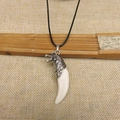 Wolf tooth resin pendant necklace with silver wolf head carving and black cord - Wolf Head Pendant + Wax Cord