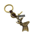 Bronze elk head keychain with braided brown leather strap on a white background - Antique Bronze