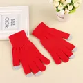Detail view of red knitted touch screen gloves with grey conductive fingertips and ribbed cuffs - L / Red