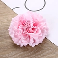 Close-up of a pink gradient artificial peony hair clip on a minimalist wood surface - Light Pink