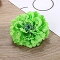 Single green fabric peony flower hair clip for hanfu on a minimalist wooden background - Grass Green