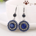 Vintage boho zonnebloem oorbellen met donkerblauwe hoofdsteen in antiek zilveren - Antiek Zilver + Koningsblauw