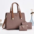Dreiteiliges Damen-Handtaschen-Set aus lila Stoff mit braunem Lederbesatz und Goldbeschlägen - Braun