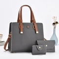 Dreiteiliges graues Canvas-Handtaschen-Set mit braunen Ledergriffen und Schultergurten - Schwarz