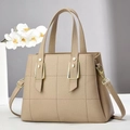 Chic tan quilted tote bag with golden hardware and lychee grain texture for women - Khaki