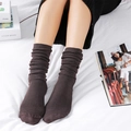 Brown cotton slouch socks in ribbed knit style for a cozy winter outfit look - One Size / Coffee