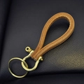 Vintage handmade brass leather keychain with horseshoe D-ring and brown cowhide strap - Natural