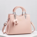 Pink lychee texture handbag with woven handle, elephant charm, and adjustable strap - 26x12x20cm / Pink