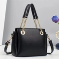 Fashionable black lychee grain leather handbag with gold chain handle and shoulder strap - Black