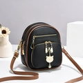 Zwarte crossbodytas van generfd leer met bruine bies en gouden kattenhanger - Zwart en Khaki