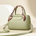 Light green Boston pillow bag in lychee leather with decorative silk scarf handle - Green