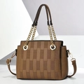 Detail of brown checkered handbag featuring gold chain handle and lychee texture - Dark Khaki