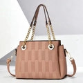 Minimalist pink crossbody bag with geometric texture and gold chain strap on white background - Pink
