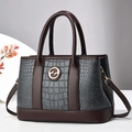 Elegante borsa a mano in finta pelle marrone e grigia con chiusura a scatto dorata - Grigio