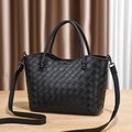 Elegant black woven tote bag for women with trapezoid design and adjustable shoulder strap - Black