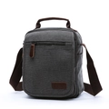 Dark grey canvas crossbody bag for men with brown handles and a front zipper pocket - Gray