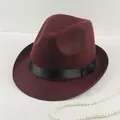 Detail of a dark red wool felt fedora hat featuring a black satin ribbon and bow - 58 One Size / Wine Red (Short Brim)