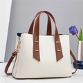 Minimalist white leather tote bag with dark brown straps and elegant gold metal hardware - Off-white